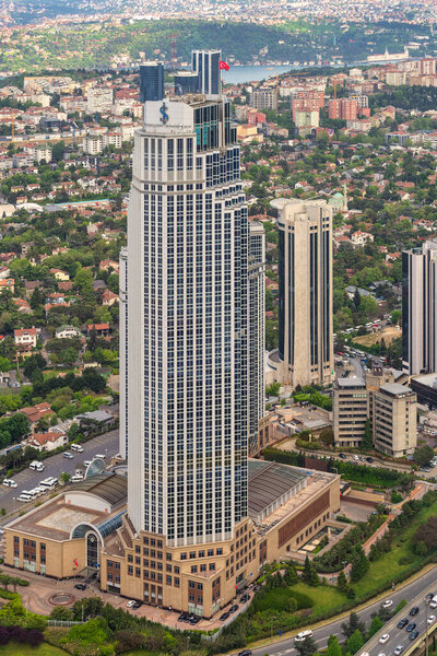 Aerial shot of Headquarters of Isbank commercial bank of Turkey located in the Levent district of Istanbul, Turkey, with Bosphorus Strait in the far end. Photo taken from Istanbul Sapphire