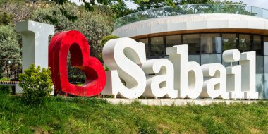 View of a prominent I Love Sabail signage situated within Sabail Park, Baku, Azerbaijan, capturing the vibrant ambiance of a sunny spring day clipart