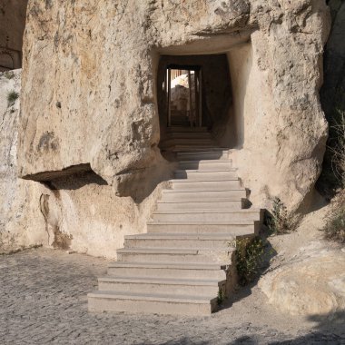 Exterior entrance with stairs to Dark Church, or Karanlik Kilise, a rock-cut cave church at Goreme UNESCO World Heritage Site, Cappadocia, Turkey