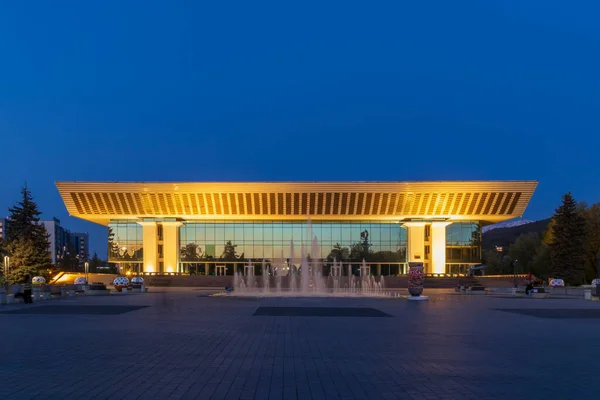 stock image Almaty City Kazakhstan. 5 May 2023. Palace of the Republic and Concert Hall at night. (former Lenin Palace of Culture). USSR State Prize for architecture