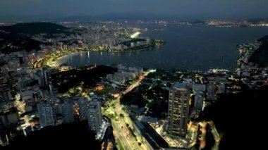 Night City At Downtown District In Rio De Janeiro Brazil. Dark Night Life Skyline. Tourism Scenery. Downtown District At Rio De Janeiro Brazil. Dark Illuminated Skyline. Dark Skyline.