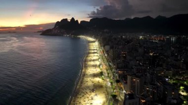 Sunset Skyline At Ipanema Beach In Rio De Janeiro Brazil. Sunset Dusk Skyline. Tourism Scene. Ipanema Beach At Rio De Janeiro Brazil. Sunset Evening Skyline. Sunset Skyline.