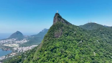 Christ The Redeemer At Corcovado Mountain In Rio De Janeiro Brazil. Mountains Corcovado Skyline. Tourism Scene. Christ The Redeemer At Rio De Janeiro Brazil. Christ Redeemer Mountains Skyline.