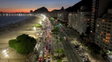 Sunset Skyline At Copacabana Beach In Rio De Janeiro Brazil. Sunset Dusk Skyline. Tourism Scenery. Copacabana Beach At Rio De Janeiro Brazil. Sunset Evening Skyline. Sunset Skyline.