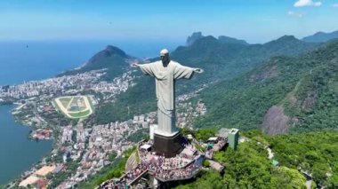 Christ The Redeemer At Corcovado Mountain In Rio De Janeiro Brazil. Mountains Corcovado Skyline. Tourism Scene. Christ The Redeemer At Rio De Janeiro Brazil. Christ Redeemer Mountains Skyline.