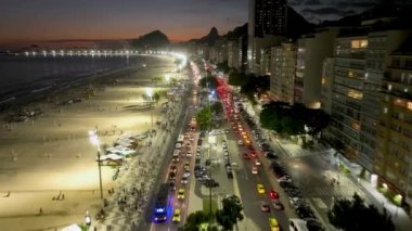Traffic Lights At Copacabana Beach In Rio De Janeiro Brazil. Sunset Dusk Skyline. Tourism Scenery. Copacabana Beach At Rio De Janeiro Brazil. Sunset Evening Skyline. Sunset Skyline.