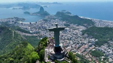 Christ The Redeemer At Tijuca Park In Rio De Janeiro Brazil. Mountains Corcovado Skyline. Tourism Scene. Christ The Redeemer At Rio De Janeiro Brazil. Christ Redeemer Mountains Skyline.