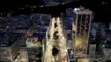 Night Landscape At Leme Beach In Rio De Janeiro Brazil. Dark Night Life Skyline. Tourism Scenery. Leme Beach At Rio De Janeiro Brazil. Dark Evening Skyline. Dark Skyline.