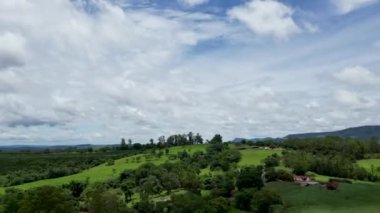 Time Lapse Clouds At Rural Landscape In Countryside Landscape. Country Green. Field Environmental. Rural Landscape At Countryside Landscape. Plantation Country. Farming Environmental.