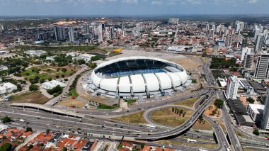 Şehir merkezindeki Dunes Arena Soccer Stadyumu 'nun panorama hava manzarası Natal Brazil. Rio Grande do Norte Eyaleti. Turizm simgesi şehir manzarası. Natal Brazil şehir merkezindeki Spor Merkezi Dunes Arena.