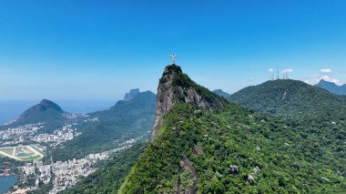 Christ The Redeemer At Corcovado Mountains In Rio De Janeiro Brazil. Mountains Corcovado Skyline. Tourism Scenery. Christ The Redeemer At Rio De Janeiro Brazil. Christ Redeemer Mountains Skyline.