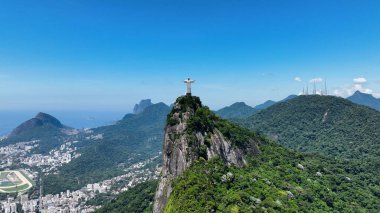 Christ The Redeemer At Corcovado Mountain In Rio De Janeiro Brazil. Mountains Corcovado Skyline. Tourism Scene. Christ The Redeemer At Rio De Janeiro Brazil. Christ Redeemer Mountains Skyline.