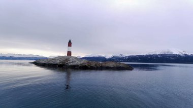 Famous lighthouse of Ushuaia City at Beagle Channel near Chile border. Patagonia Argentina. Called of End of the World Fin Del Mundo Lighthouse. Ushuaia Argentina Tierra del Fuego province. clipart