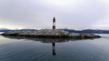 Famous lighthouse of Ushuaia City at Beagle Channel near Chile border. Patagonia Argentina. Called of End of the World Fin Del Mundo Lighthouse. Ushuaia Argentina Tierra del Fuego province. clipart