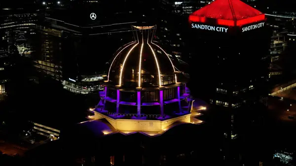 stock image Sandton At Night At Johannesburg In Gauteng South Africa. City At Night Landscape. Illuminated Building. Johannesburg At Gauteng South Africa. Landmark Buildings. Colorful Skyline.