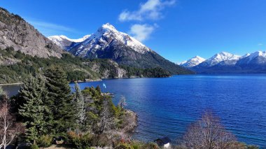 Bariloche Skyline At San Carlos De Bariloche In Rio Negro Argentina. Snowy Mountains. Chico Circuit. Travel Background. Bariloche Skyline At San Carlos De Bariloche In Rio Negro Argentina. clipart