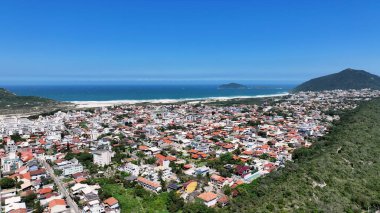 Santinho Beach At Florianopolis In Santa Catarina Brazil. Beach Landscape. Nature Seascape. Travel Destination. Santinho Beach At Florianopolis In Santa Catarina Brazil. Turquoise Water. clipart