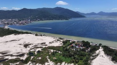 Conceicao Lagoon At Florianopolis In Santa Catarina Brazil. Sand Dunes. Scenic Lake. Beach Landscape. Conceicao Lagoon At Florianopolis In Santa Catarina Brazil. Nature Paradise. clipart