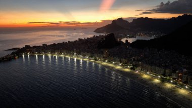 Sunset Skyline At Copacabana Beach In Rio De Janeiro Brazil. Sunset Dusk Skyline. Tourism Scene. Copacabana Beach At Rio De Janeiro Brazil. Sunset Evening Skyline. Sunset Skyline.