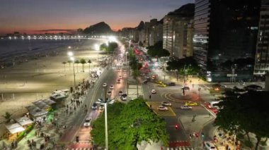Sunset Beach At Copacabana Beach In Rio De Janeiro Brazil. Sunset Dusk Skyline. Tourism Scene. Copacabana Beach At Rio De Janeiro Brazil. Sunset Evening Skyline. Sunset Skyline.