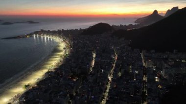 Sunset Skyline At Copacabana Beach In Rio De Janeiro Brazil. Sunset Dusk Skyline. Tourism Scene. Copacabana Beach At Rio De Janeiro Brazil. Sunset Evening Skyline. Sunset Skyline.
