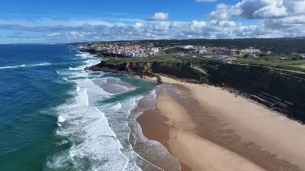Big Beach At Sintra In Lisbon District Portugal. Beach Landscape. Nature Seascape. Travel Destination. Big Beach At Sintra In Lisbon District Portugal. Turquoise Water.