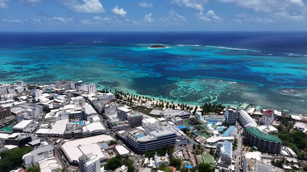 Spratt Bight Beach In San Andres Providencia Y Santa Catalina Colombia. Amazing Skysrapers And Traffic On Street Viewed From Above. Shore Sky Clouds Beach Sea. International Beach Panorama.