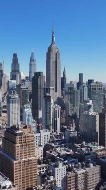New York 'ta Manhattan' daki Empire State Binası. Şehir merkezinde göz kamaştırıcı. Turizm Tarihi Yer. New York 'taki Empire State Binası. Yükseklik Binaları.
