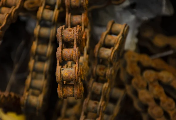 Rusty chains are like a strong, reliable connection. Concept for the presentation of an old or obsolete block chain. Rusty chains background