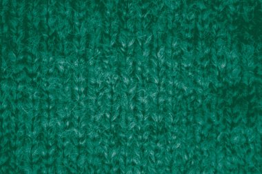 Makro örgü kumaş. Eski örgü arka planı. El yapımı Kış Kumaşı. Kazma dokusu. İplik ipliği. İskandinav Noel battaniyesi. Yapı halısı nakışı. Örgü desenli.