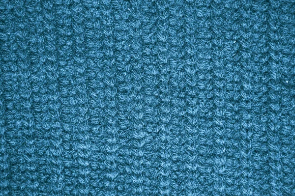 Weave Knitted Blanket. Abstract Woolen Pattern. Handmade Christmas Background. Structure Knitted Blanket. Blue Soft Thread. Scandinavian Warm Yarn. Closeup Scarf Garment. Knitted Sweater.