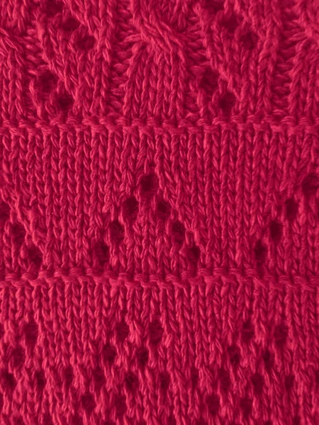 クリスマスのニットの背景 概要織物を織る 暖かい手作りの糸刺繍 Xmasニットテクスチャ ヴィンテージコットンブランケット 北欧の壁紙を織ります 赤いクリスマスのニッティングパターン — ストック写真