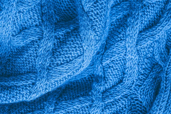 綿編みブランケット ヴィンテージウール生地 ジャカード クリスマス背景 ニット ブランケットだ 青い構造の糸 北欧の冬のジャンパー リネン糸素材 編組ニットセーター — ストック写真