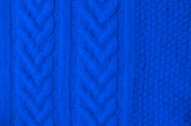 Yapı örülmüş doku. Soyut Örülmüş Süveter. Jacquard Noel Tasarımı. Keten örgü dokusu. Pamuk ipliği. İskandinav kumaşı. Fiber dekor malzemesi. Örgü Arkaplan.