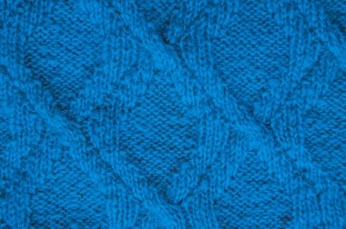 Yapı örgü battaniyesi. Soyut Yün Tekstil. Örgü Noel arkaplanı. Pamuk örgülü süveter. Mavi Detay İpliği. Nordic Warm Print. Yumuşak Atkı Giysisi. Örülmüş Süveter.