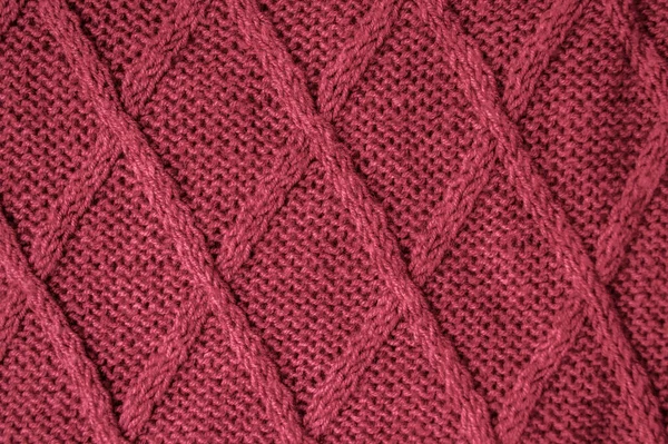 詳細ニット生地 ヴィンテージ織のデザイン ジャカードウォームの背景を閉じます 抽象的なウール 赤い織り糸 北欧のクリスマスの装飾 ソフトジャンパー素材 コットンニットウール — ストック写真