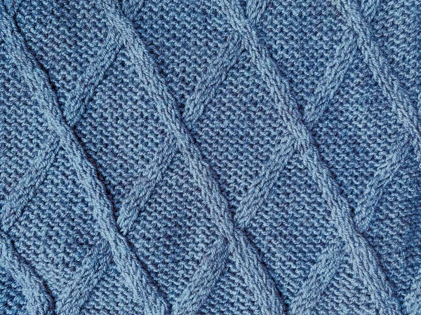 詳細はニットブランケット 概要ウールテキスタイル ジャカード暖かい背景 ニットセーター 青い綿の糸 北欧の冬服 閉鎖は刺繍を再生しました 編組ニットセーター — ストック写真