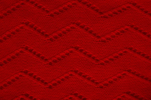 摘要羊毛 老式编织机的设计 棉布针织物圣诞背景 针织毛线 红色细尾线 北欧冬季跳投 纤维毛毯羊绒 宏观针织织物 — 图库照片#
