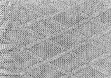 Örgü dokusu. Vintage Wool Design. El yapımı Tatil Arkaplanı. Yakından örülmüş doku. Ayrıntılı iplik. Nordic Xmas Eşarbı. Makro Bez Duvar Kağıdı. Örgü Dokusu.