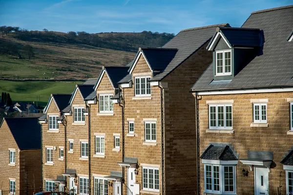 stock image Modern affordable homes built from Peak District stone in Buxton, England.