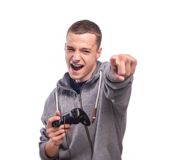 Positieve Jonge Kerel Met Een Gamepad Zijn Handen Tegen Een Rechtenvrije Stockfoto's