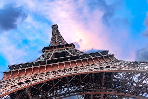 stock image The Eiffel Tower in Paris against the backdrop of a beautiful evening sky.