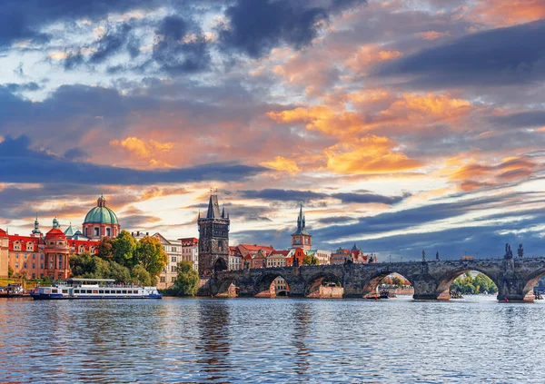 stock image Prague - Charles bridge, Czech Republic. Scenic aerial sunset on the architecture of the Old Town Pier and Charles Bridge over the Vltava River in Prague, Czech Republic.