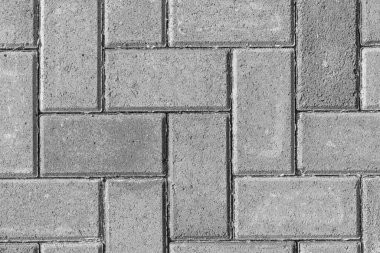 Kaya dokusu. Caddenin dibindeki asfaltlı fayansların dokusu. Beton döşeme levhaları.