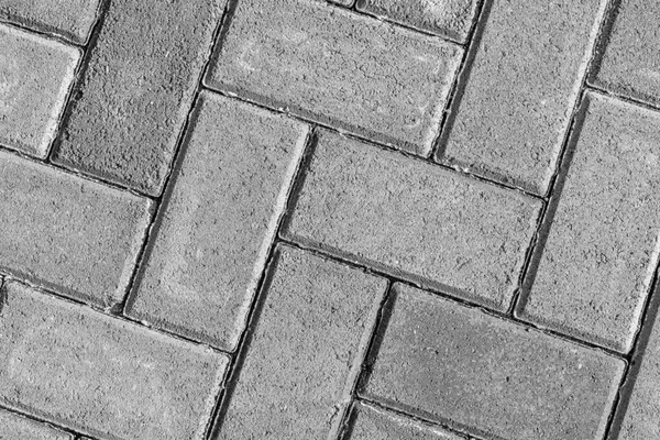 石の質感を与える 通りの底にある舗装されたタイルの質感 コンクリート舗装スラブ — ストック写真