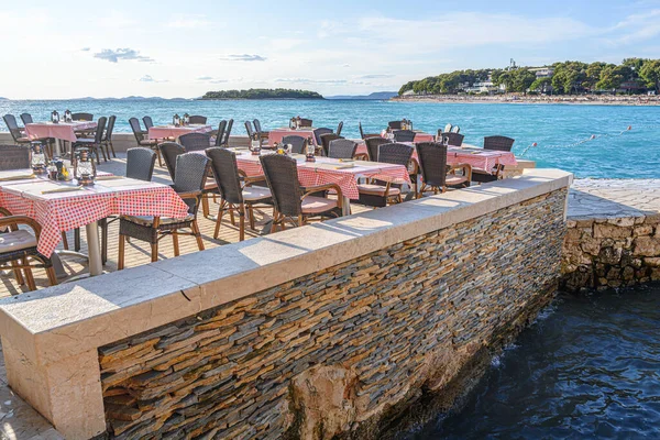 The interior of an open-air restaurant on the seashore. Adriatic Sea.