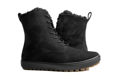 Beyaz arka planda izole edilmiş bir çift kadın kış ayakkabısı..