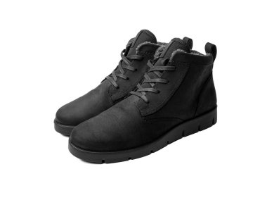 Beyaz arka planda izole edilmiş bir çift kadın kış ayakkabısı..