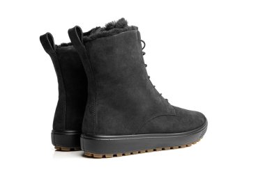 Beyaz arka planda izole edilmiş bir çift kadın kış ayakkabısı..