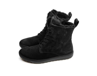 Beyaz arka planda izole edilmiş bir çift kadın kış ayakkabısı..